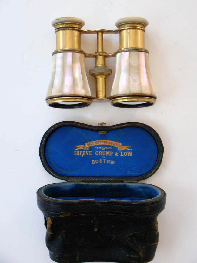 A pair of mother-of-pearl mounted gilt brass French opera glasses retailed by Shreve Crump & Low of Boston circa 1890